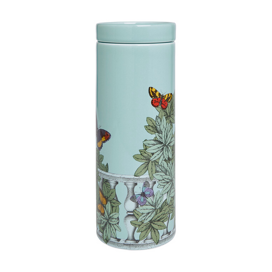 Fornasetti NEL MENTRE tall cented candle - Décor Farfalle e balaustra - Fragrance Giardino Segreto - Milk Concept Boutique